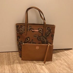 Michael Kors purse never used. All tags attached.